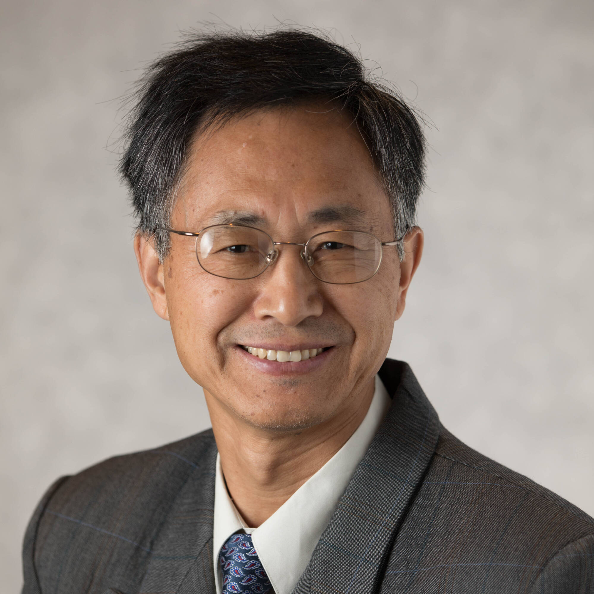Headshot of Xinli Wang
